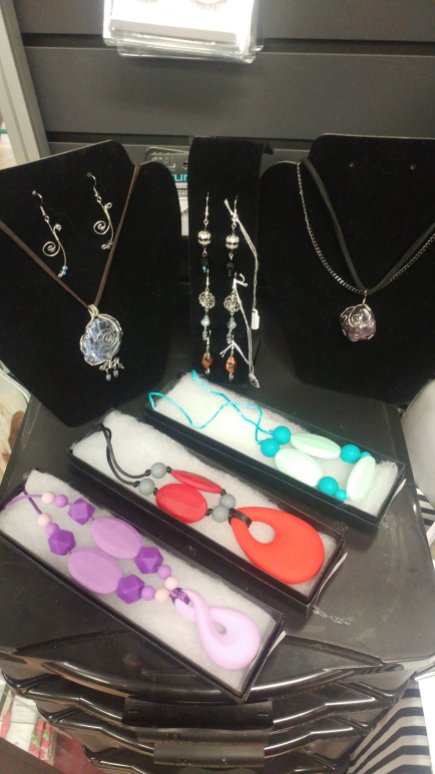 So many inventive necklaces. Wire wrapped gems, custom orders and PBA free New Mother's Teething Necklaces
